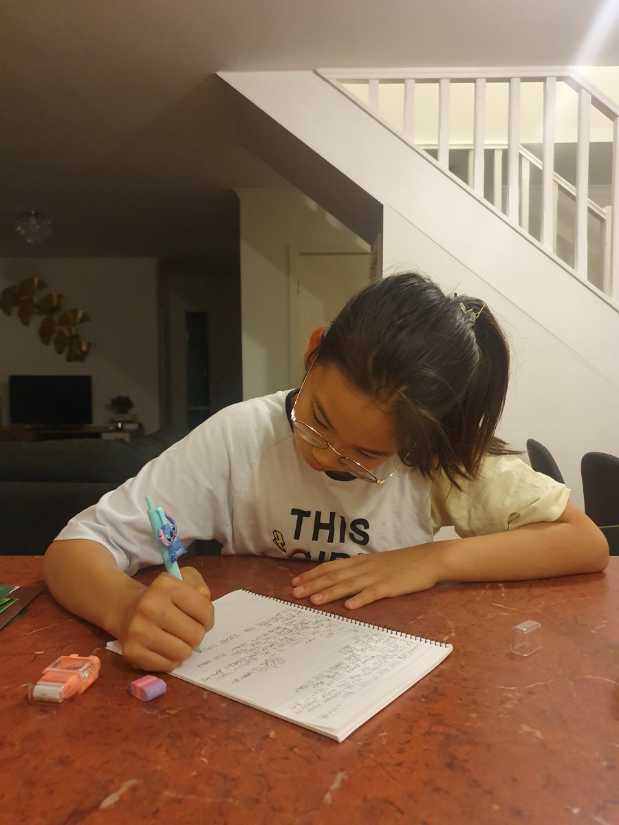 Writing at a table